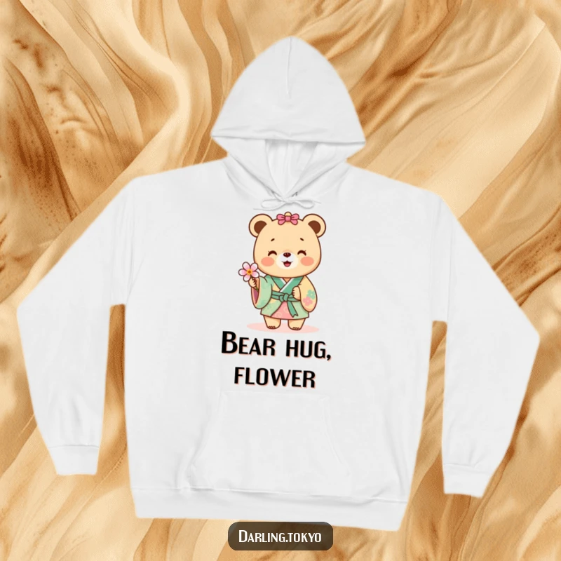 Funny bear in a colorful kimono offering a delicate flower, a humorous and warm hoodie.