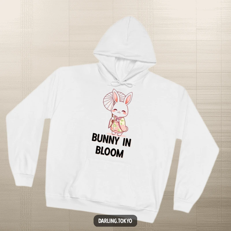 Funny hoodie featuring a cheerful rabbit character in a floral kimono, holding a delicate parasol with serene charm.