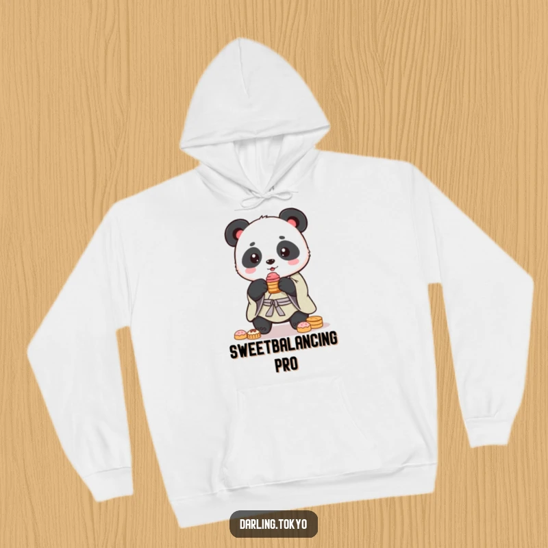 Funny panda in a kimono wobbles with a stack of sweets, offering comfort and humor in this cozy hoodie.