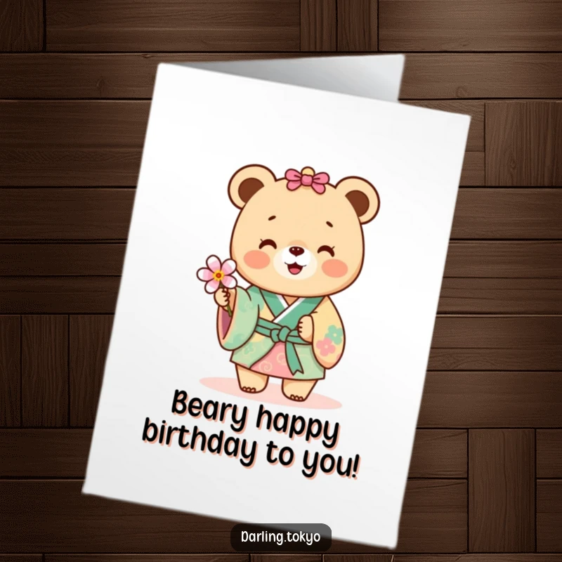 Funny Free Printable Birthday Card: Tiny bear in colorful kimono joyfully offers a delicate flower.