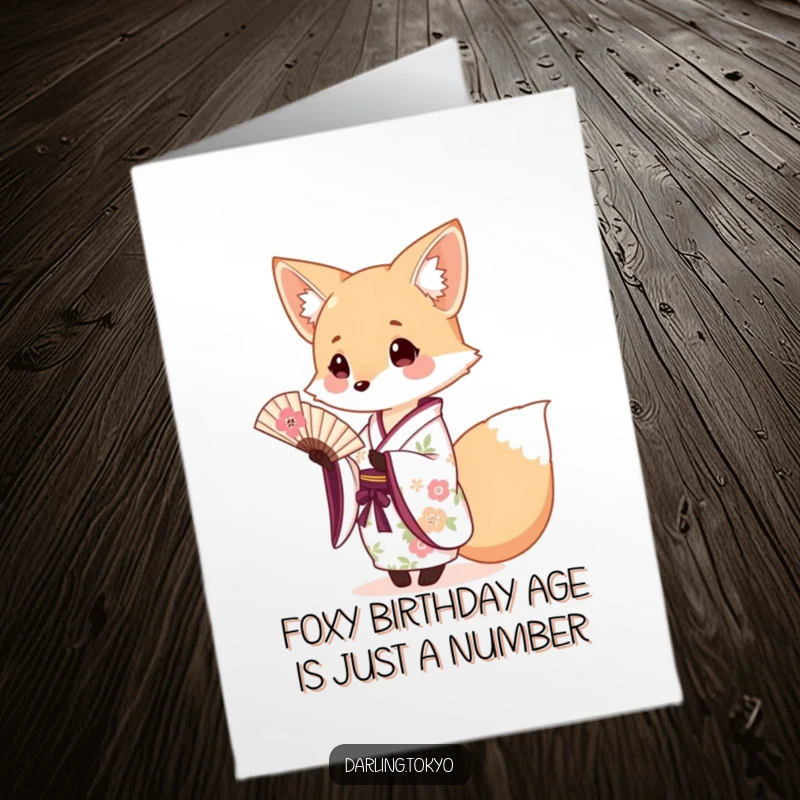 Funny Free Printable Birthday Card: Cute fox in floral kimono gracefully offers tiny fan, radiating charm.