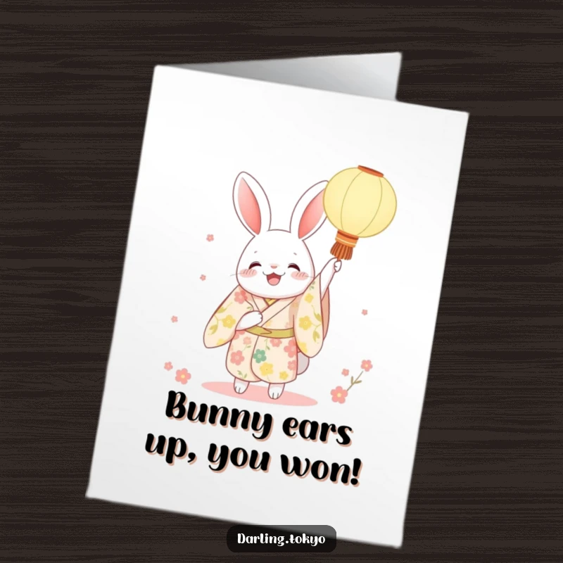 Funny Free Printable Rabbit Congratulations Card, a character in a floral kimono joyfully holding up a paper lantern, celebrating success with festive spirit.