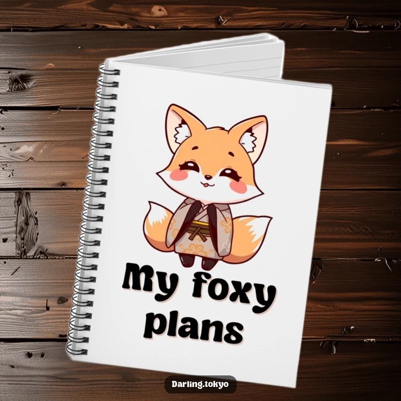 Funny notebook depicting a smiling fox in a patterned kimono, playfully bowing, suitable for writing and drawing.