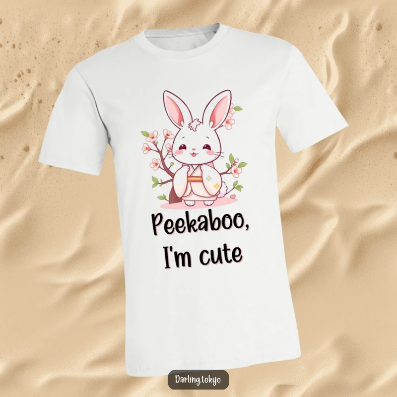 Funny bunny wearing a pastel kimono, playfully peeking from behind a cherry blossom on a t-shirt.